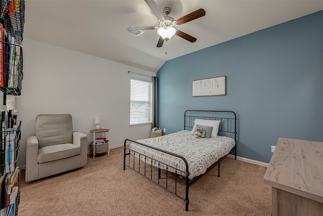 carpeted bedroom featuring ceiling fan and lofted ceiling