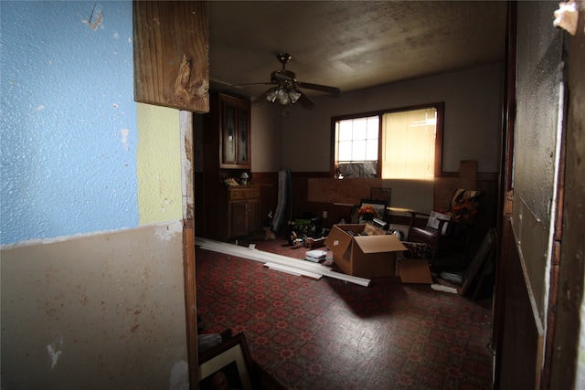 miscellaneous room featuring ceiling fan