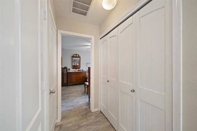 hall featuring light hardwood / wood-style floors