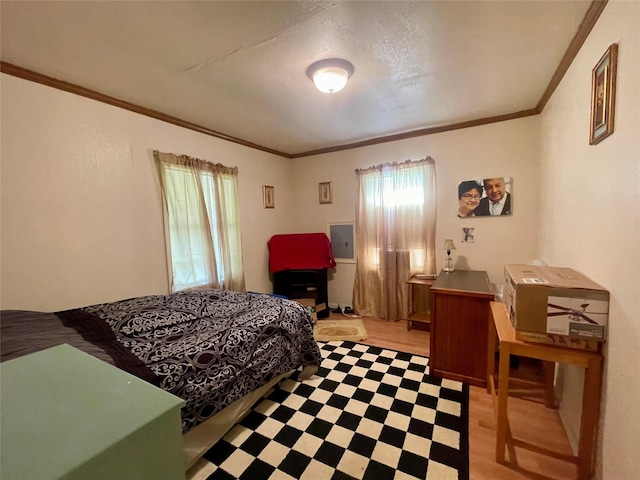8860 S State Highway 71, El Campo, TX 77437 - bedroom featuring crown molding and light floors