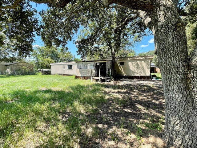 8860 S State Highway 71, El Campo, TX 77437 - view of rear view of house