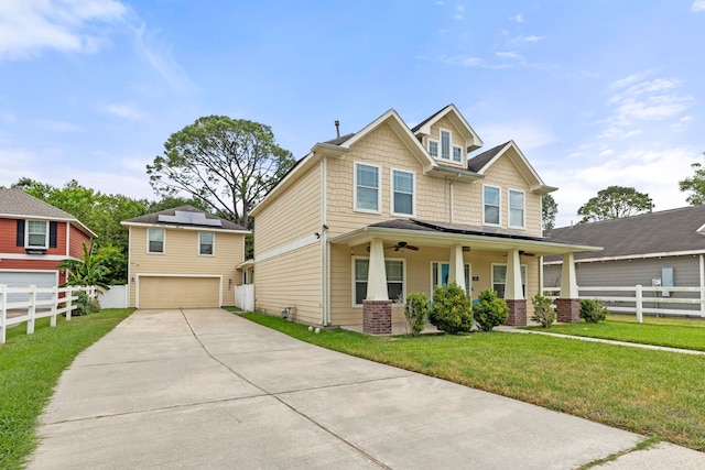 craftsman-style home with a garage, a front yard, and a porch