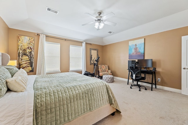 bedroom featuring ceiling fan and carpet