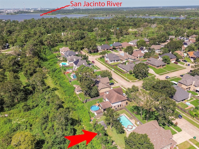 birds eye view of property featuring a water view