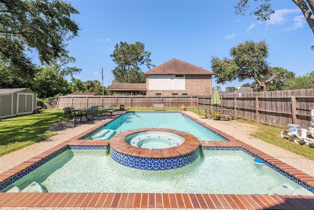 view of swimming pool featuring a shed and an in ground hot tub