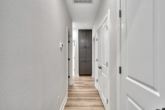 hall featuring light wood-type flooring