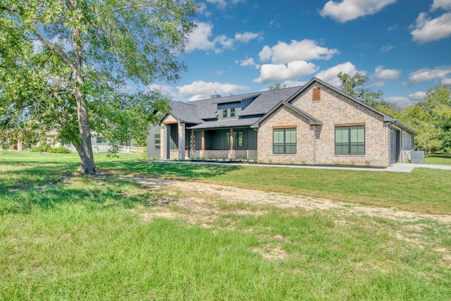 view of front of home with a front yard