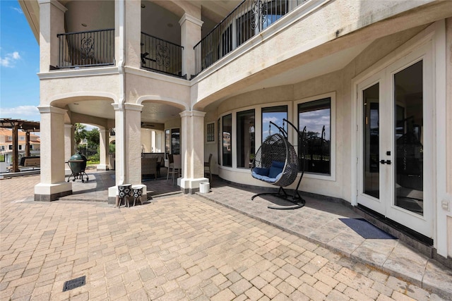 view of patio / terrace with a balcony