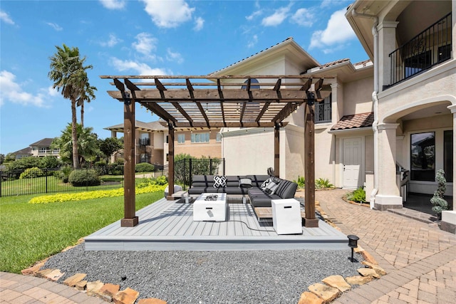 view of patio with an outdoor living space, a pergola, and a balcony