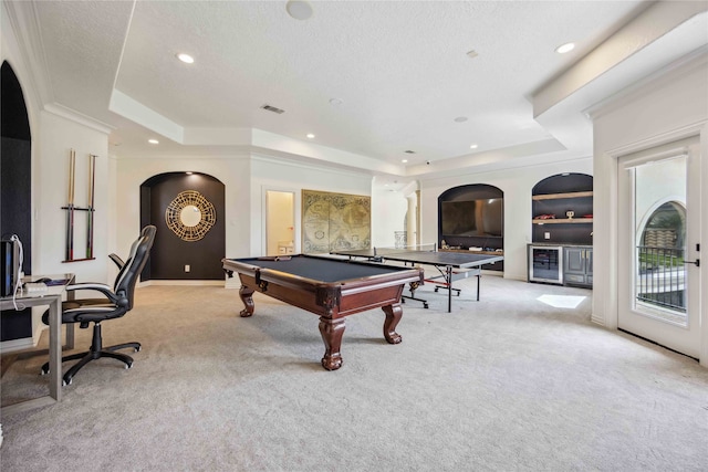 playroom featuring a raised ceiling, light colored carpet, built in features, and pool table