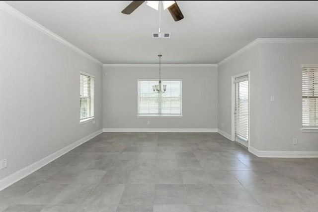 empty room featuring ornamental molding and ceiling fan with notable chandelier