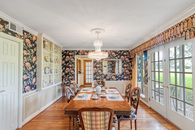 dining space with plenty of natural light and french doors