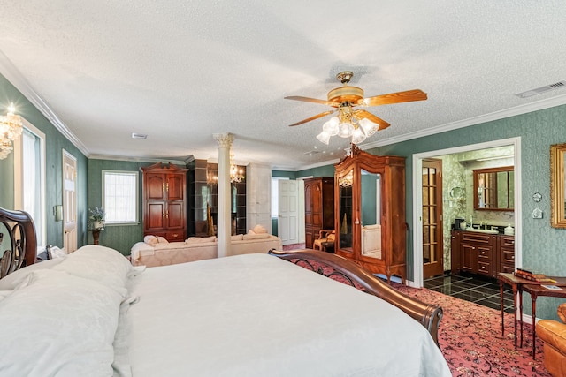 bedroom featuring a textured ceiling, ceiling fan, ornamental molding, and ensuite bath