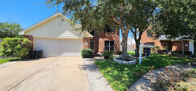 view of front of home with a garage and a front lawn