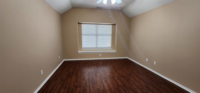 unfurnished room with dark hardwood / wood-style flooring, ceiling fan, and lofted ceiling