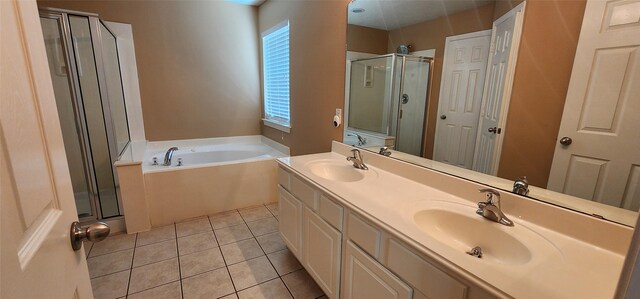 bathroom with vanity, plus walk in shower, and tile patterned floors