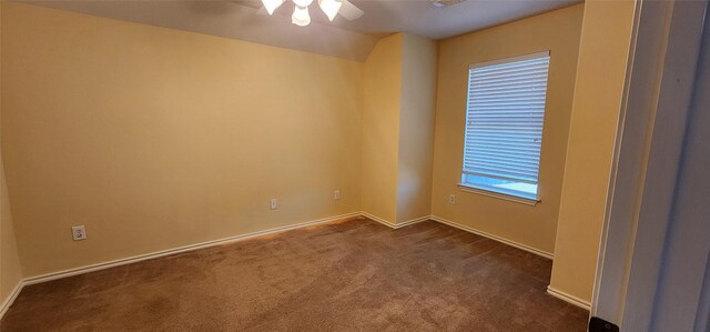 unfurnished room featuring carpet flooring and ceiling fan