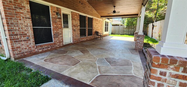 view of patio featuring ceiling fan