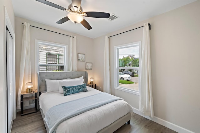 bedroom featuring ceiling fan and light hardwood / wood-style flooring