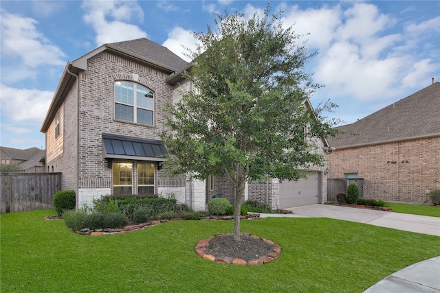 view of front of home with a garage and a front lawn