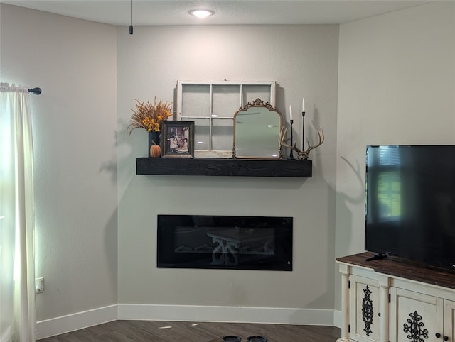 living room with dark hardwood / wood-style floors