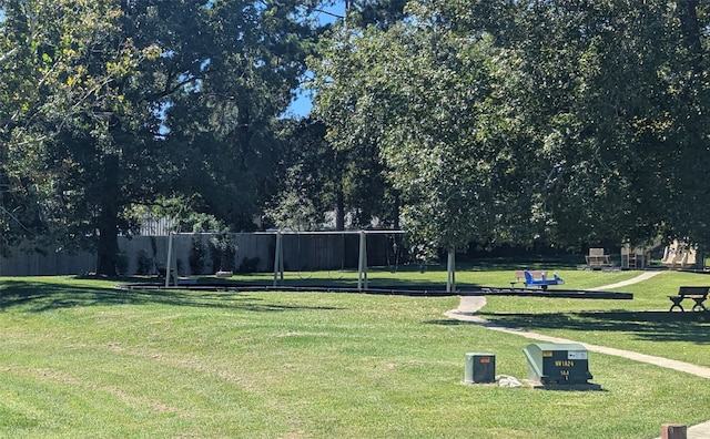 view of home's community featuring a lawn