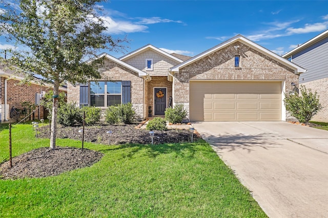 view of front of property with a garage and a front lawn