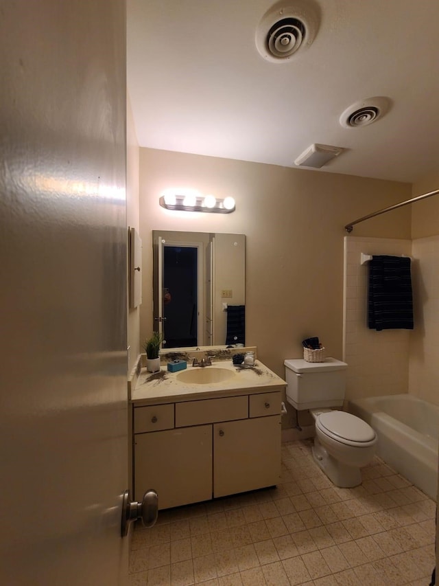 full bathroom featuring shower / bathtub combination, vanity, and toilet