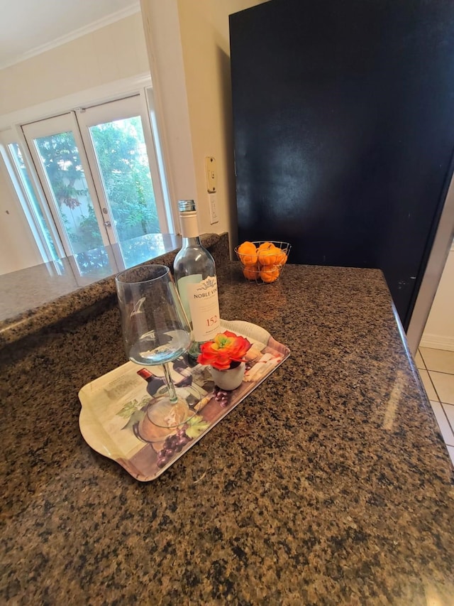 room details featuring crown molding and tile patterned flooring