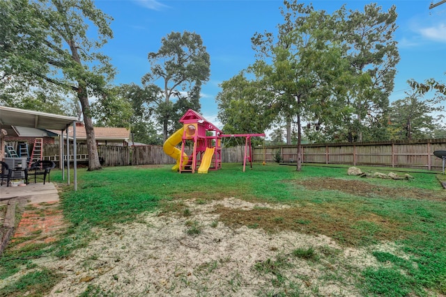 view of yard with a playground