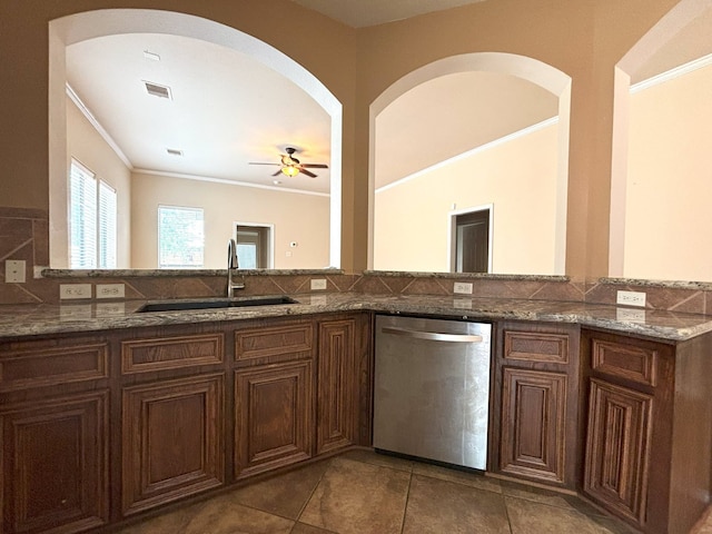 kitchen featuring crown molding, dishwasher, ceiling fan, and sink