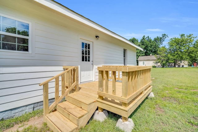 deck featuring a lawn