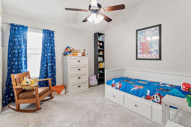 bedroom featuring lofted ceiling, carpet floors, and ceiling fan