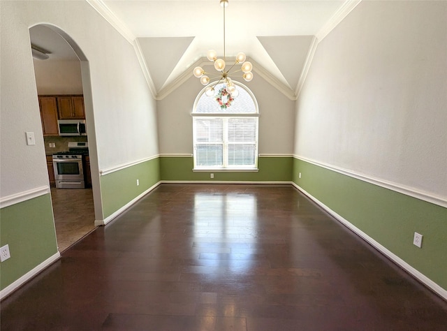 unfurnished room with dark wood-type flooring, crown molding, arched walkways, and vaulted ceiling