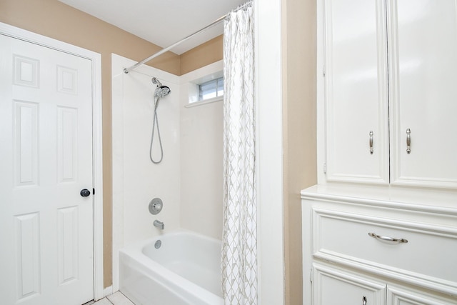 bathroom featuring shower / bathtub combination with curtain