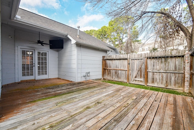 wooden terrace featuring ceiling fan