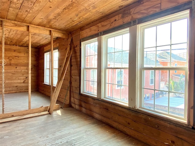 2127 Broadway St, Galveston, TX 77550 - unfurnished room featuring wood ceiling, wood finished floors, and wooden walls
