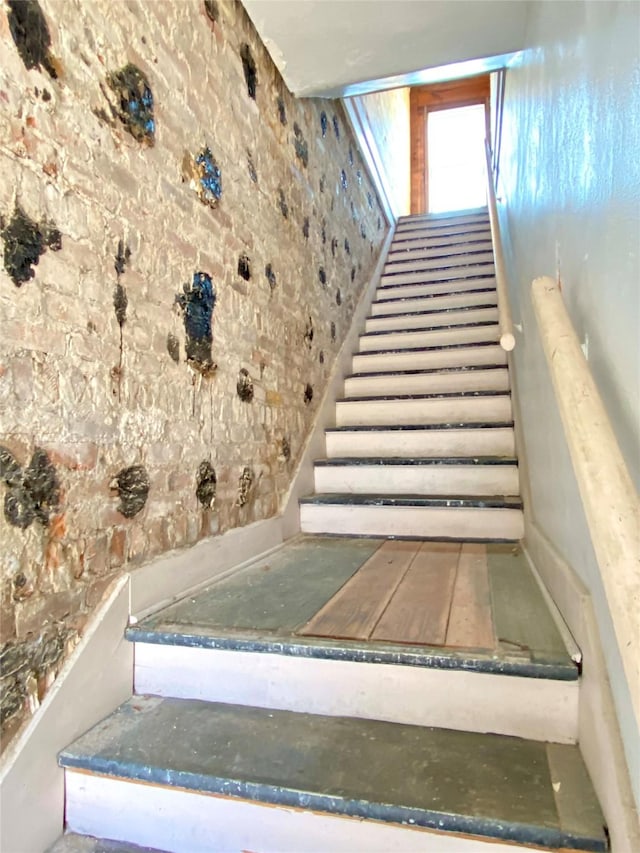 2127 Broadway St, Galveston, TX 77550 - staircase with brick wall