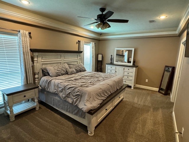 carpeted bedroom featuring crown molding and ceiling fan