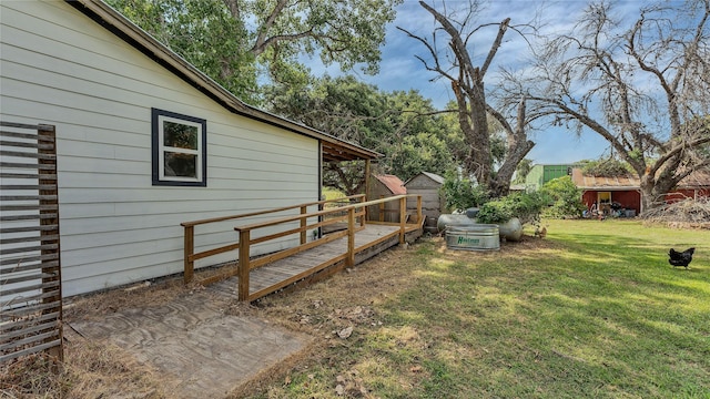 view of yard with an outdoor structure and a shed