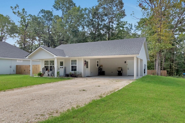 ranch-style home with a front lawn