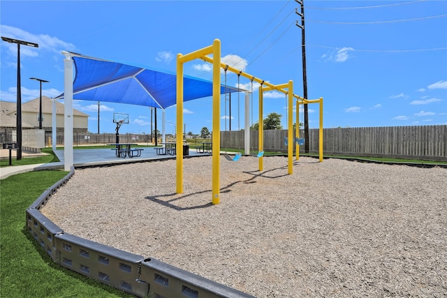 view of playground with basketball court