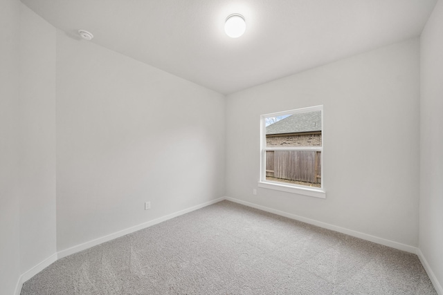 spare room featuring carpet flooring