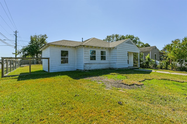 exterior space with a lawn