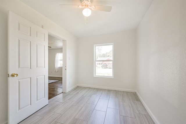 empty room featuring ceiling fan