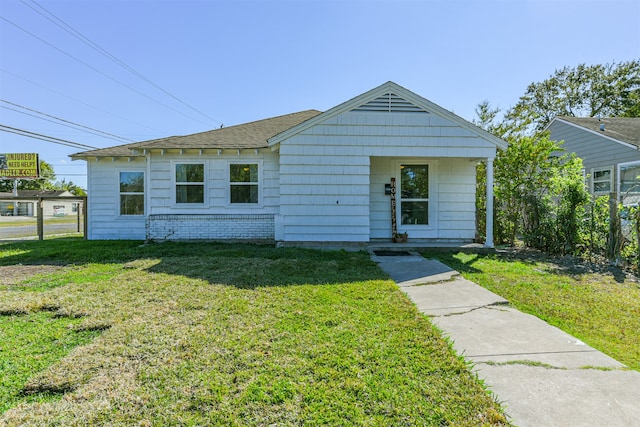 view of front of house with a front lawn