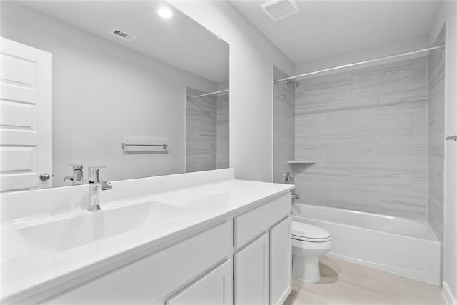 full bath with toilet, shower / bathtub combination, visible vents, and vanity