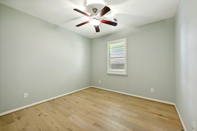 unfurnished room with light hardwood / wood-style flooring and ceiling fan