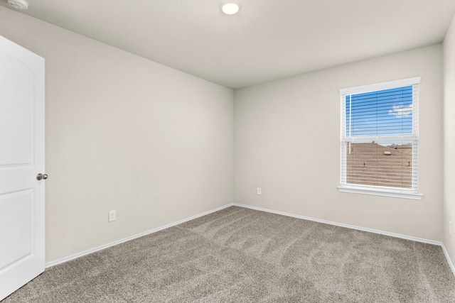 empty room with carpet floors