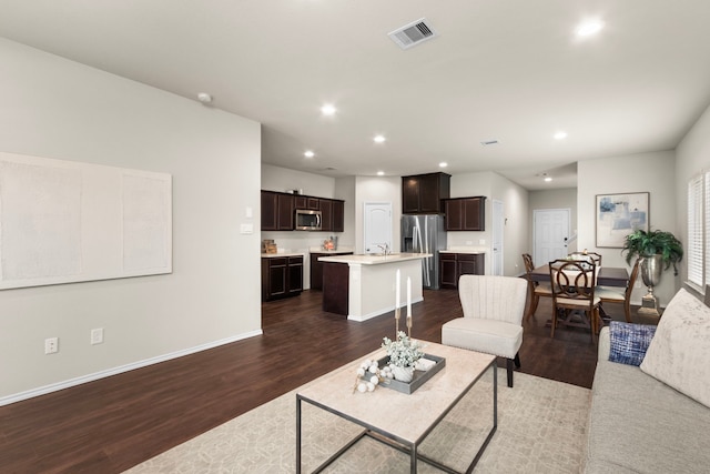 living room featuring dark hardwood / wood-style floors